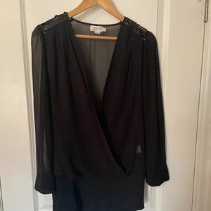 Sheer, black body suit with sequin shoulder detail and snap crotch, size small